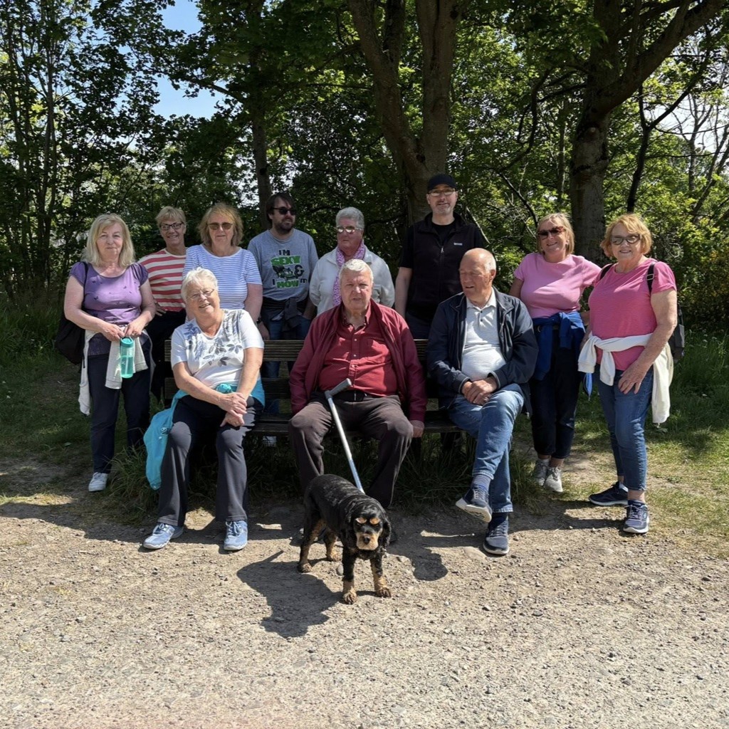 Group of people gathered for a wellness walk