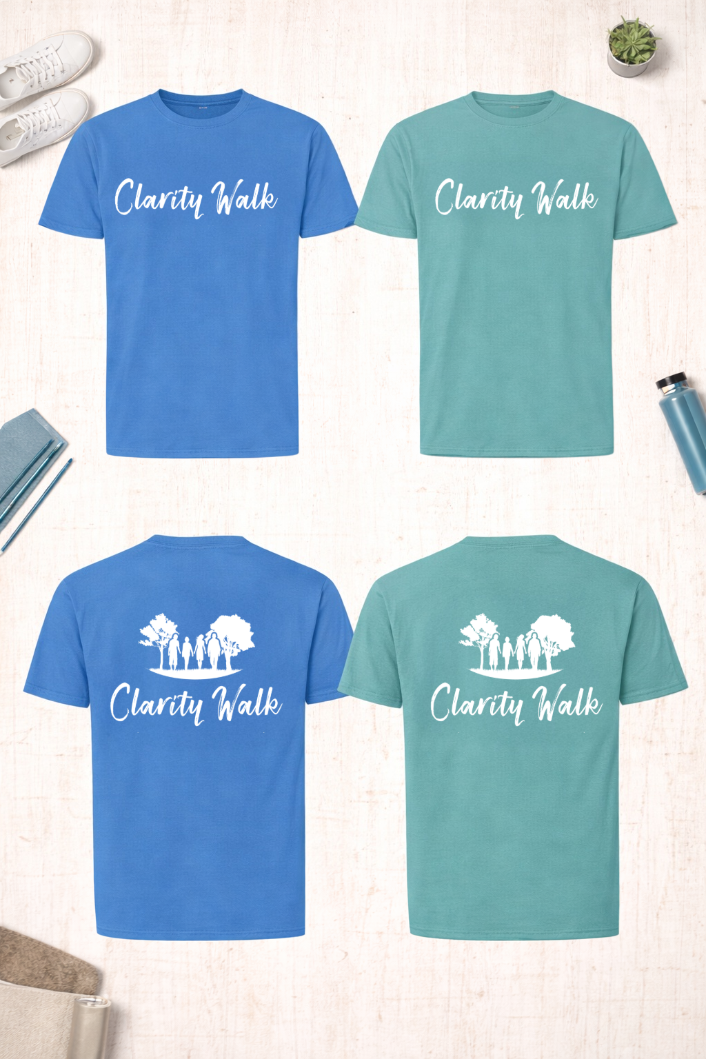 Picture of the front and back of t-shirts in green and blue with Clarity Walk logo.